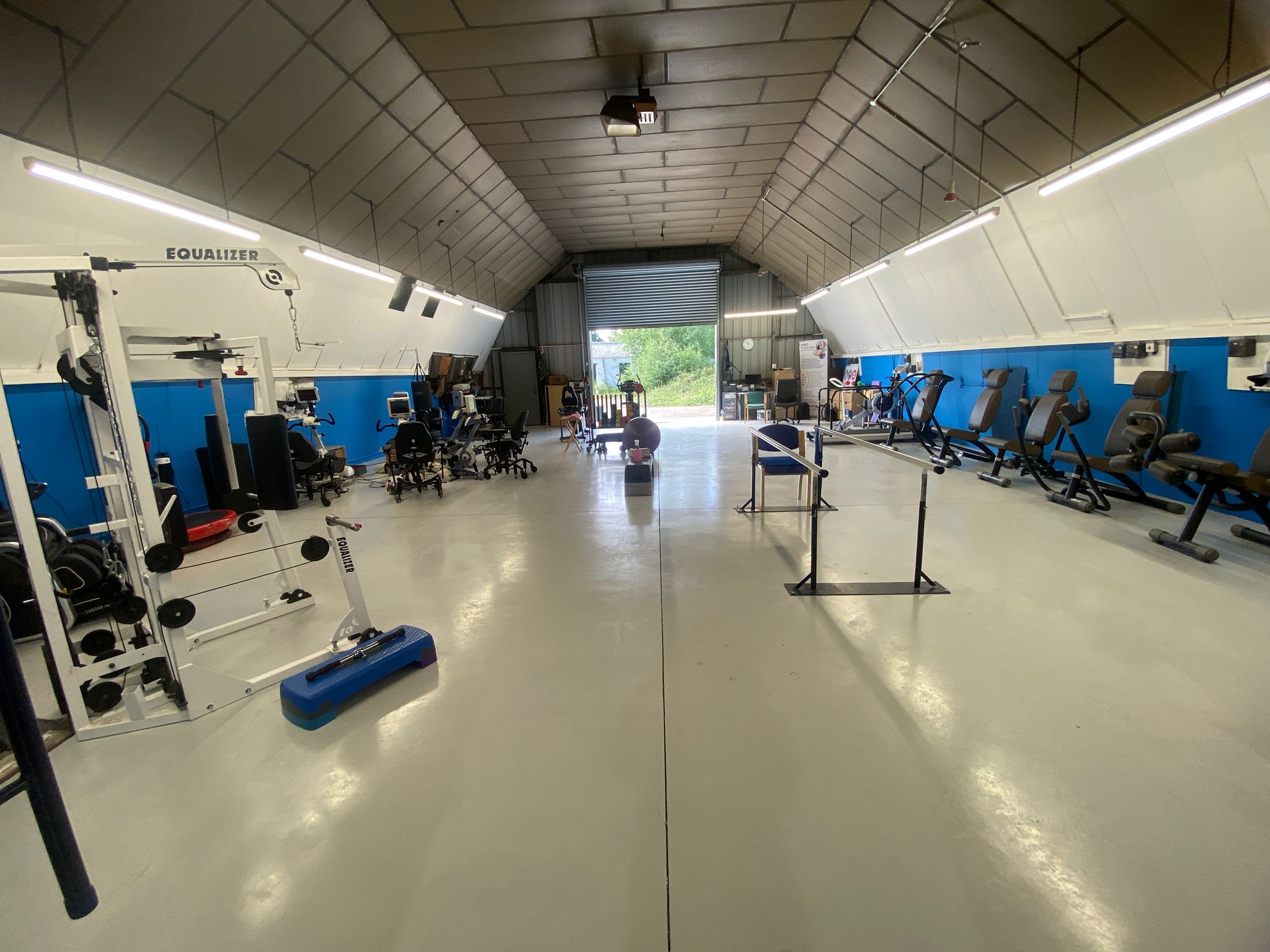 The Angel Centre therapy gym interior showing accessible exercise equipment and supportive environment for people with disabilities and chronic health conditions